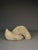 A large abstract sculpture made to go into a garden as decorative art object. It is made of case concrete (hollow inside)....