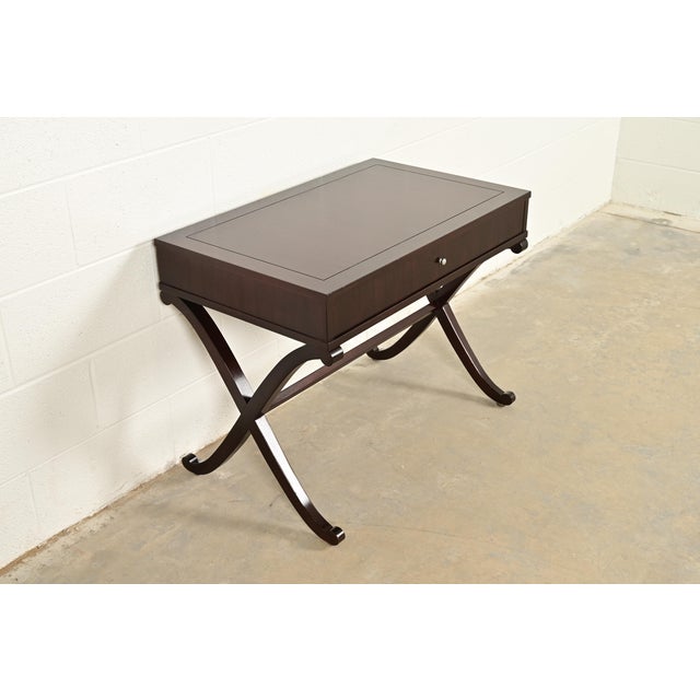 A gorgeous modern Regency style dark mahogany nightstand or tea table By Barbara Barry for Baker Furniture USA, Circa Late...