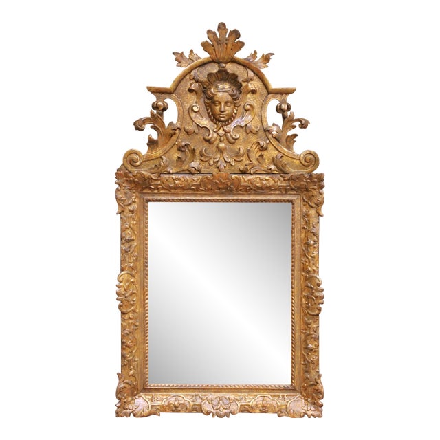 18th Century French Regence Carved Giltwood Wall Mirror With Cherub Crest For Sale