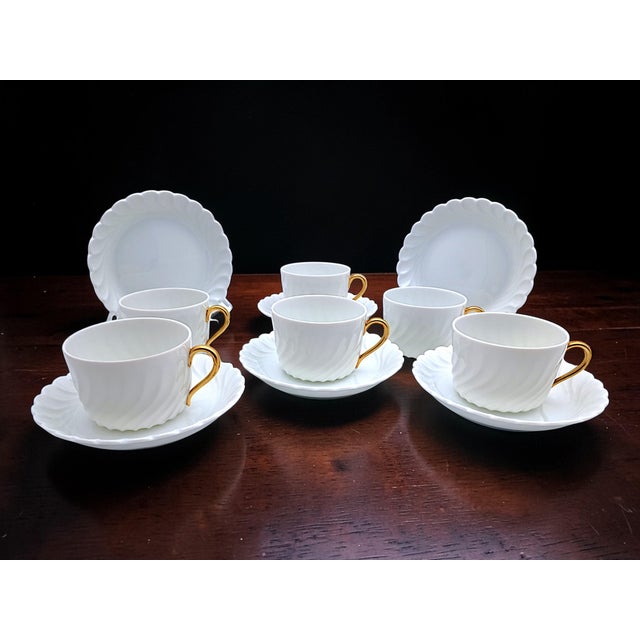 A refined set of 6 teacups and saucers in the finest white porcelain, crafted by the prestigious Richard Ginori company....
