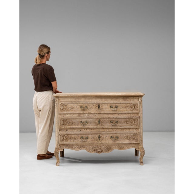 Here is a chest of drawers, its whitewashed weathered wood, bombe form, 3 drawers the first thing to catch the eye. The...
