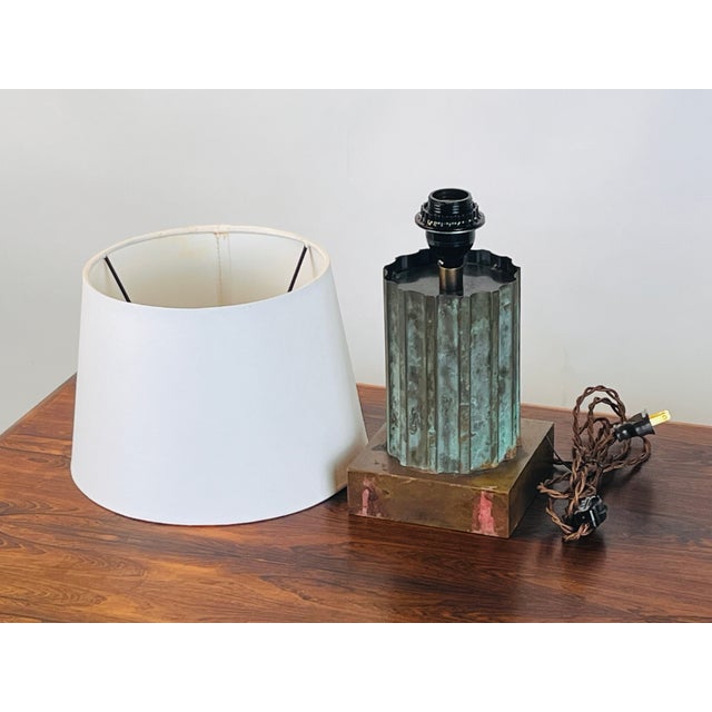 Small verdigris bronze & brass Neoclassical column lamp. Verdigris patina column and brass plinth base fitted with a...