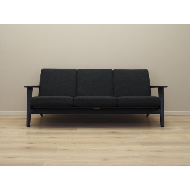 The sofa was made in the 1960s, designed by leading danish designer hans j. Wegner. Manufactured by the getama...