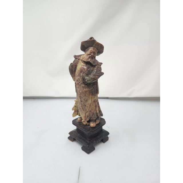Carved Chinese warrior statue from natural Shoushan stone This statue dates around the late 1800's and is mounted on a...