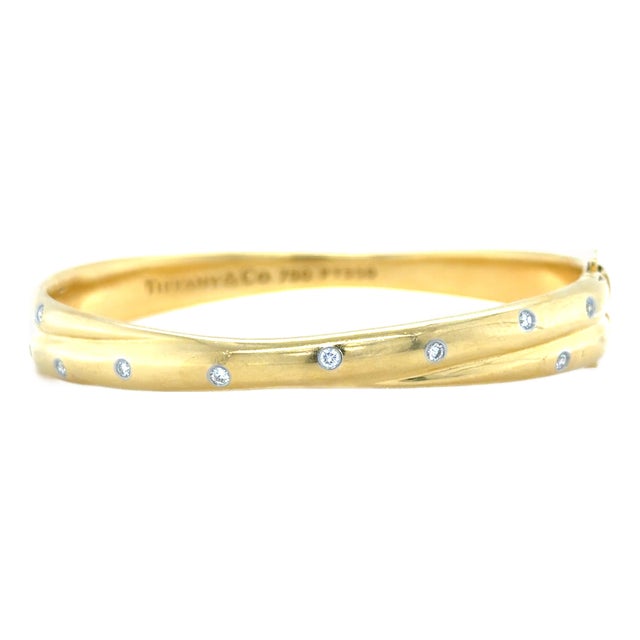 Late 20th Century Tiffany & Co. Etoile 18k Yellow Gold, Platinum and Diamond Bangle Bracelet For Sale