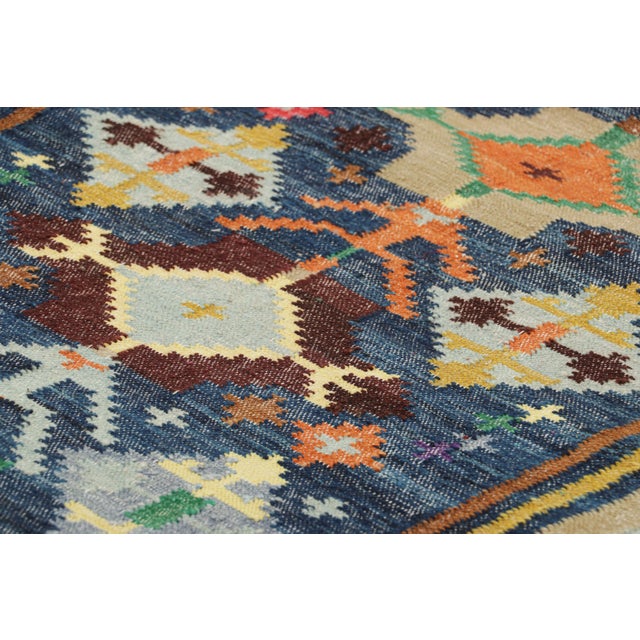 Made with handwoven wool and silk, this 3x12 dhurrie flat weave runner rug is an exciting new entry in Rug & Kilim’s...