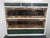 Made of fir wood and lined with reclaimed wood. It features drawers of various sizes. The central drawers have glass...