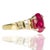 14k Ring set with 1 Rubellite Tourmaline weighing 5.13 carats and 14 baguette diamonds weighing approximately 0.50 carats....