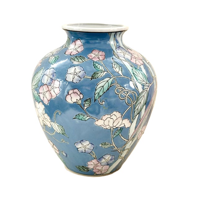 Gorgeous blue hand-crafted porcelain vase from Macau. Embossed detail with birds, flowers and vines. Pretty pastel colors...