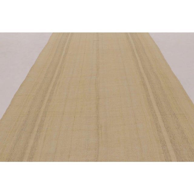 Handwoven in wool, this 7x14 contemporary runner Kilim is a sophisticated piece from Rug & Kilim’s “Rez Kilim” collection,...