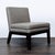 This West Elm lounge chair features a sleek gray leather seat and back with sturdy dark wood legs. Its modern, armless...
