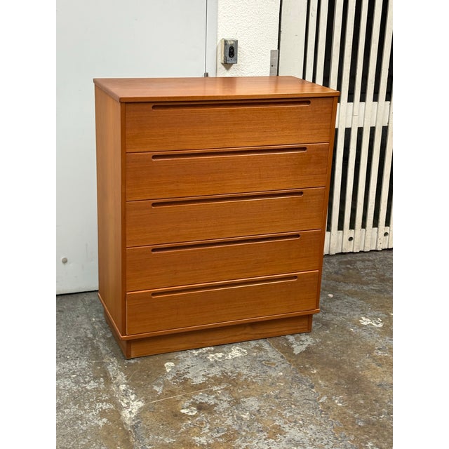 Design Plus Gallery presents a Circa 1960's Nils Jonsson for Torring Møbelfabrik Five Drawer Dresser. This teak case piece...