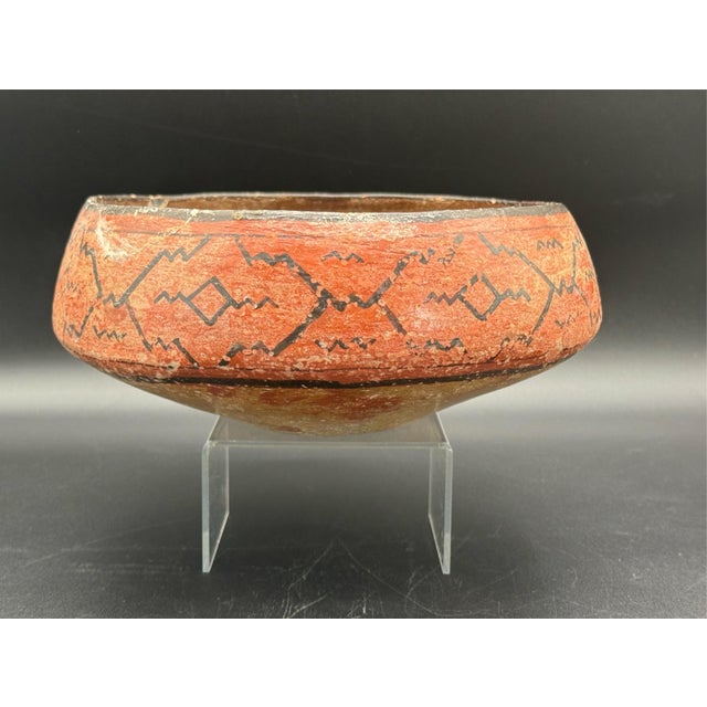 Beautiful antique handmade Shipido polychrome pottery bowl from the Amazonian rainforest of Peru. This bowl features the...