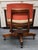 Vintage W.H. Gunlocke Chair Company mid-century modern desk chair with arms in a burnt orange naugahyde, tweed seat, heavy...