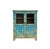 This charming, two-door wooden cabinet radiates a rustic, lived-in character with its vibrant turquoise-blue distressed...