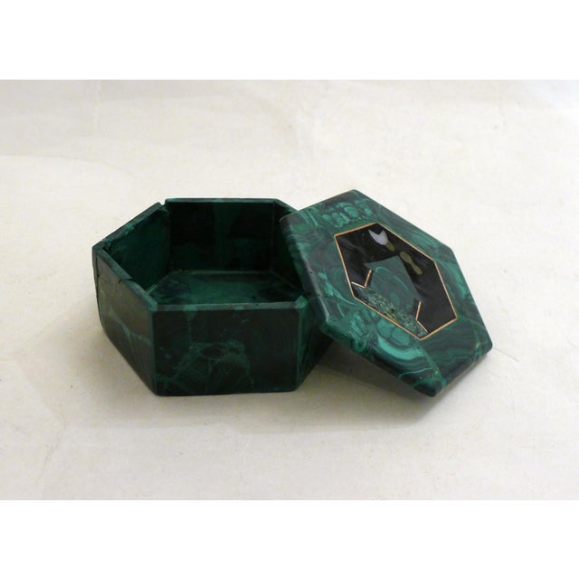 Hexagonal jewelry box made entirely of veined green malachite (resin finish); lid decorated with a hut under the moon,...