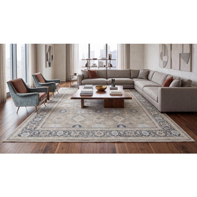 Elevate your space with this exquisite contemporary take on classic Turkish design. Hand-knotted from a luxurious blend of...