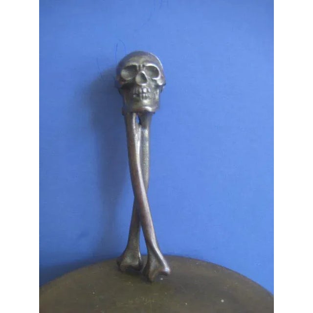 19th. Century Sculptural Cast Iron Skull Nutcracker with bone form handles. England c.1880 - 1890 Condition: excellent...
