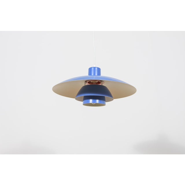 The ph 4/3 pendant lamp was designed by poul henningsen for the renowned danish manufacturer louis poulsen. Introduced in...