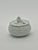 Lovely trinket box in the shape of a bird’s nest. The outer box has a woven pattern like a nest and a tiny bird with its...