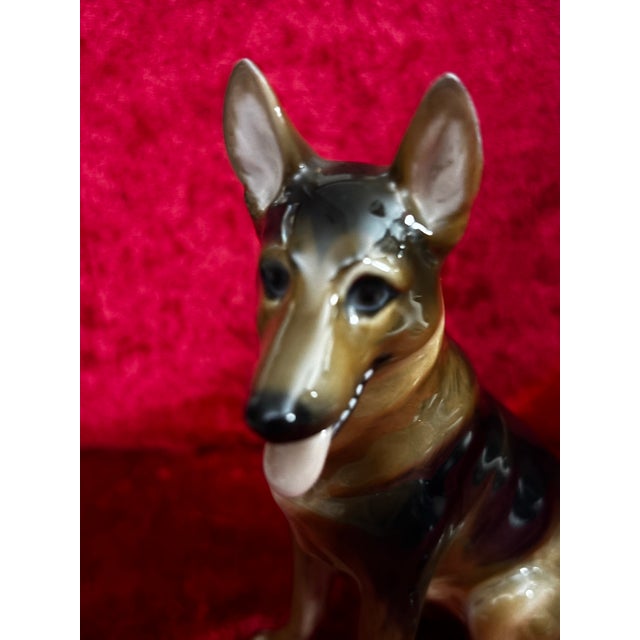 A beautifully sculpted vintage Rosenthal porcelain German Shepherd figurine, handcrafted and hand painted in Germany. This...