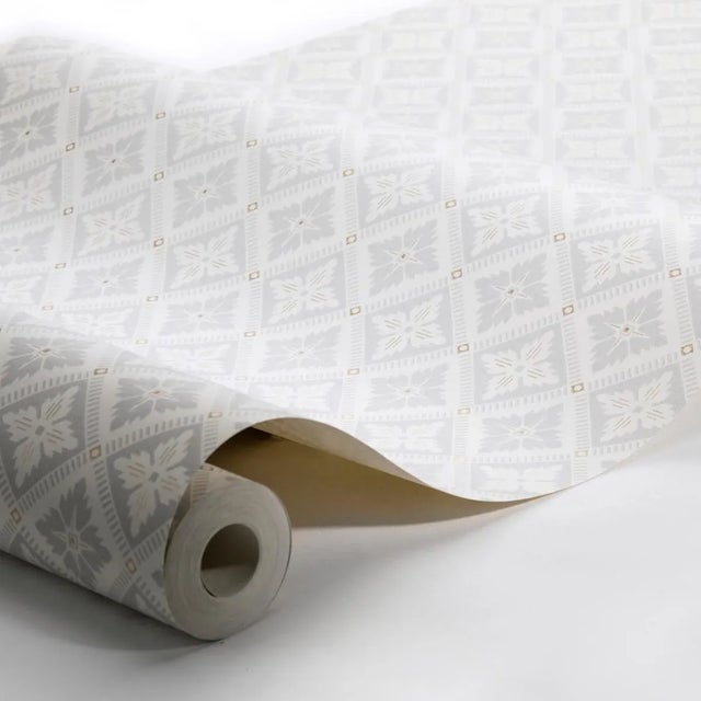 Based on the stylized flower prints popular in the late 1800s, Loka in grey-and-gold is a pleasing geometric pattern that...