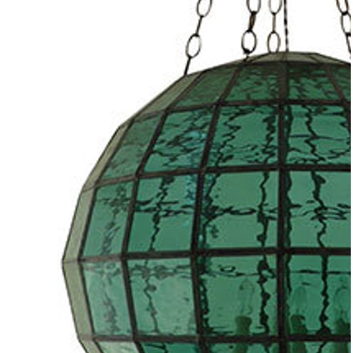 Featured Green Glass pendant, this geometric piece is both simple and complex in its structure adding a surprising...