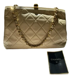 Vintage Chanel Matelassé CC Gold Beige Lambskin Kiss-Lock Chain Bag (1994–1996)