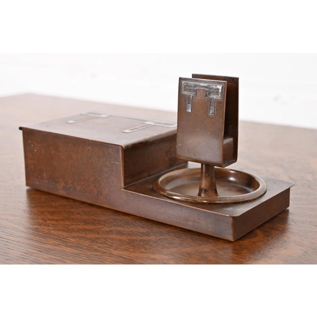 A gorgeous Arts & Crafts period humidor or cigarette box and ashtrays with match box holder By Heintz Art Metal Shop USA,...