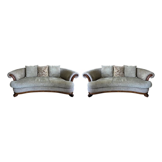 Bernhardt curved sofa, upholstered in a neutral jacquard fabric with subtle light green undertones. Features carved wood...