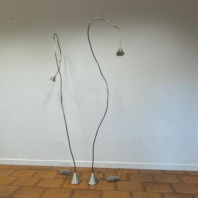 The Papiro floor lamp, a celebrated icon of contemporary design designed by Sergio Calatroni in 1989 for the historic...