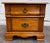 This is a Towood Lifee two-drawer nightstand in a warm light pine finish. Features carved shell accents, fluted...