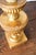 Gold urn fragment lamp with candlestick detail. Urn Fragment converted to a lamp base. New shade and wiring.