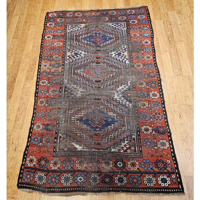 This authentic 19th century Karabagh area rug from the historic Caucasian weaving region of Armenia showcases a striking...