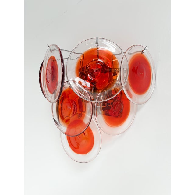 Italian design with a futuristic twist! This striking set of wall lamps makes for a bold statement piece. Each lamp...