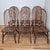 This is a heirloom quality set of 6 solid oak windsor dining chairs signed by American chairmaker H.W. Hull & Sons of...