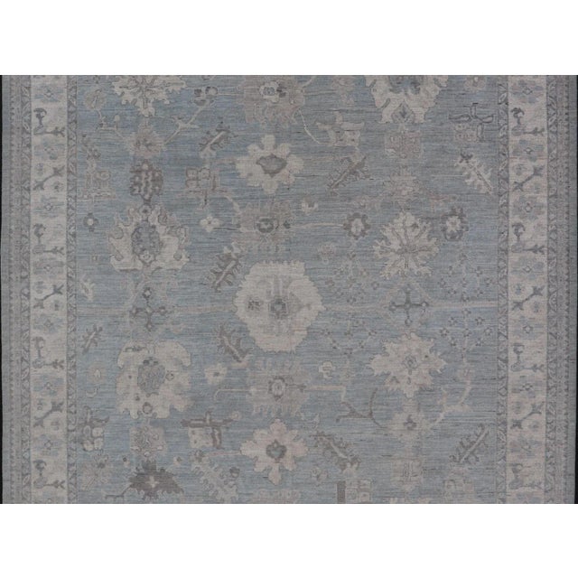Modern Oushak with Floral and Tribal Motifs with Cream, Gray and Powder Blue. Keivan Woven Arts; rug AWR-8234 Country of...