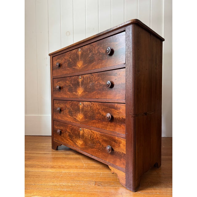 Lovely example of early American craftsmanship from Pennsylvania. Heart pine case with extra deep drawers featuring walnut...