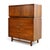 This vintage 1960s highboy dresser by Cavalier Furniture blends sculptural lines with smart storage in a compact, elegant...