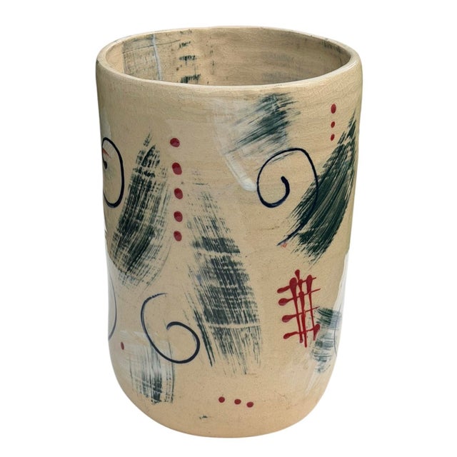 Striking vintage studio pottery vessel with a bold, Memphis-inspired abstract design. Hand-painted decoration features...