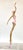 This shiny contemporary bronze sculpture of a ballerina blends elegance with a playful, whimsical spirit. Slightly...