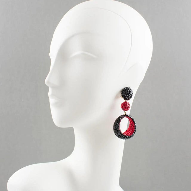Richard Kerr designed these fancy clip-on earrings in the 1980s. They are made of his signature pave rhinestones. They...