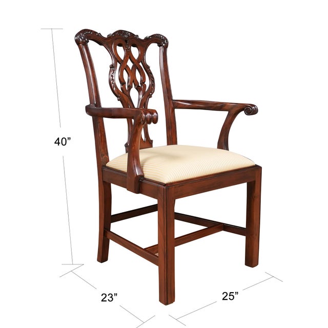 A hand carved, solid mahogany set of 10 solid Mahogany Chippendale Chairs by Niagara Furniture with 2 arm chairs and 8...