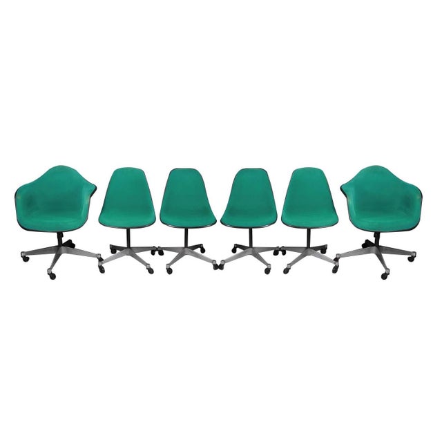 Authentic rare Mid Century Modern iconic molded fiberglass pivoting shell office or dining chairs on “contract bases” (PSC...