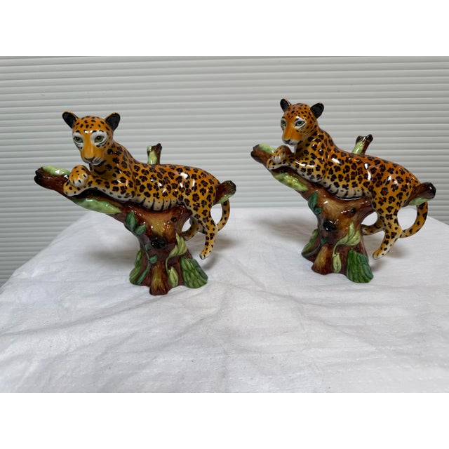 Design Plus Gallery presents a Set of Two Jaguar Figurines in Tree from Gump's by Lynn Chase. The Lynn Chase Jaguar Jungle...
