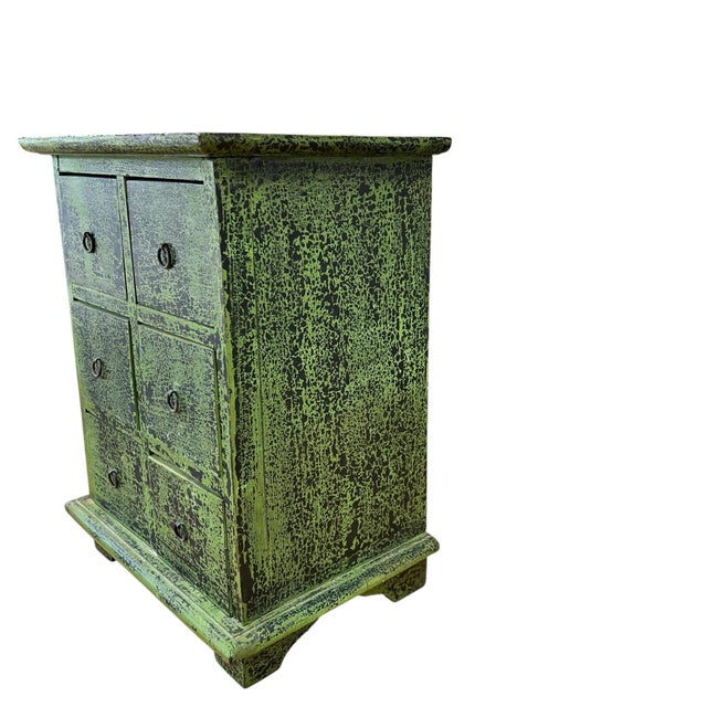 Vintage tabletop six drawer chest with green finish. Great storage for small items. Measures 13.5” w x 9.5” d x 17” h....