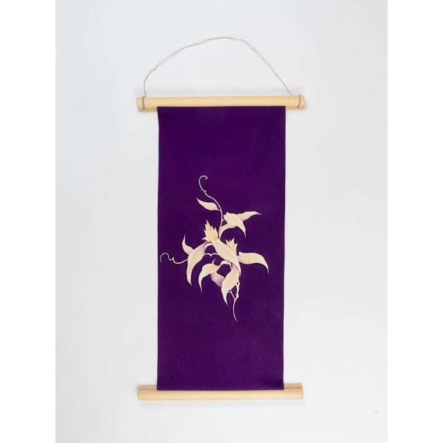 One colour. One flower. The most restrained piece in the collection. The Koki-Ran is mounted from a rare monochrome...