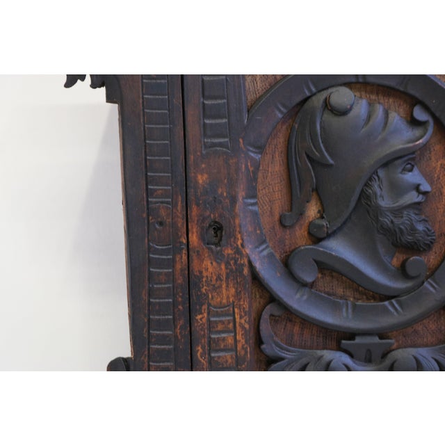 Exquisite 19th century Spanish colonial wall cabinet with a striking dark patina & carved knight. Very nice small antique...