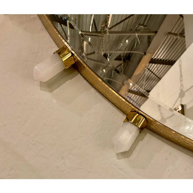 Original retail $2697, stylish Global Views Modern Lola Quartz Wall Mirror, brass exterior,showroom floor sample