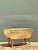 Exuding refined sculptural elegance, this mid-century modern footed decorative bowl features a distinctive gilded finish...